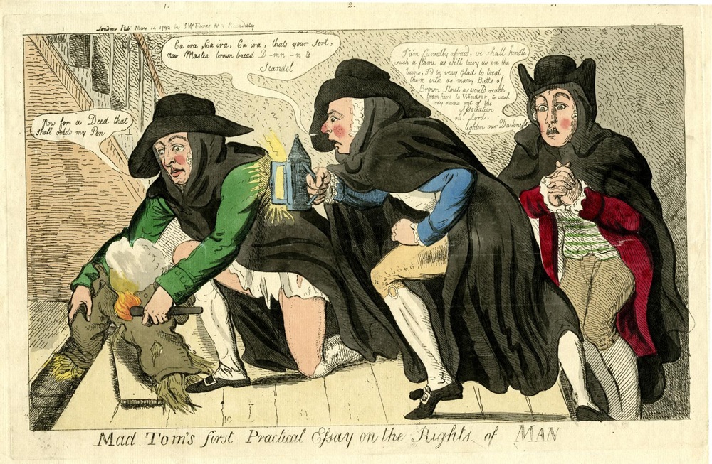 "Mad Tom's first political essay on the rights of man" a 1792 satirical etching by Isaac Cruikshank depicting Paine ('Mad Tom') as a radical conspirator, burning breeches while plotting revolution with Richard Brinsley Sheridan and Whitbread - © The Trustees of the British Museum