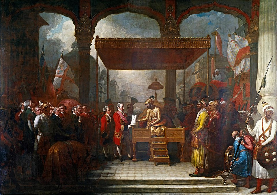 The Mughal emperor Shah Alam hands a scroll to Robert Clive, the governor of Bengal, which transferred tax collecting rights in Bengal, Bihar and Orissa to the East India Company, August 1765. Oil on canvas, Benjamin West, 1818.