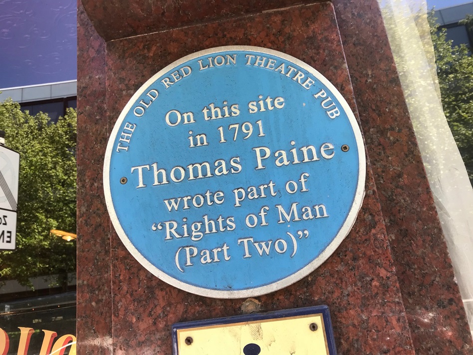 A sign at the Old Red Lion Theater Pub in London says "On this site in 1971 Thomas Paine wrote part of "Rights of Man (Part Two)" - Photo by Matt Brown