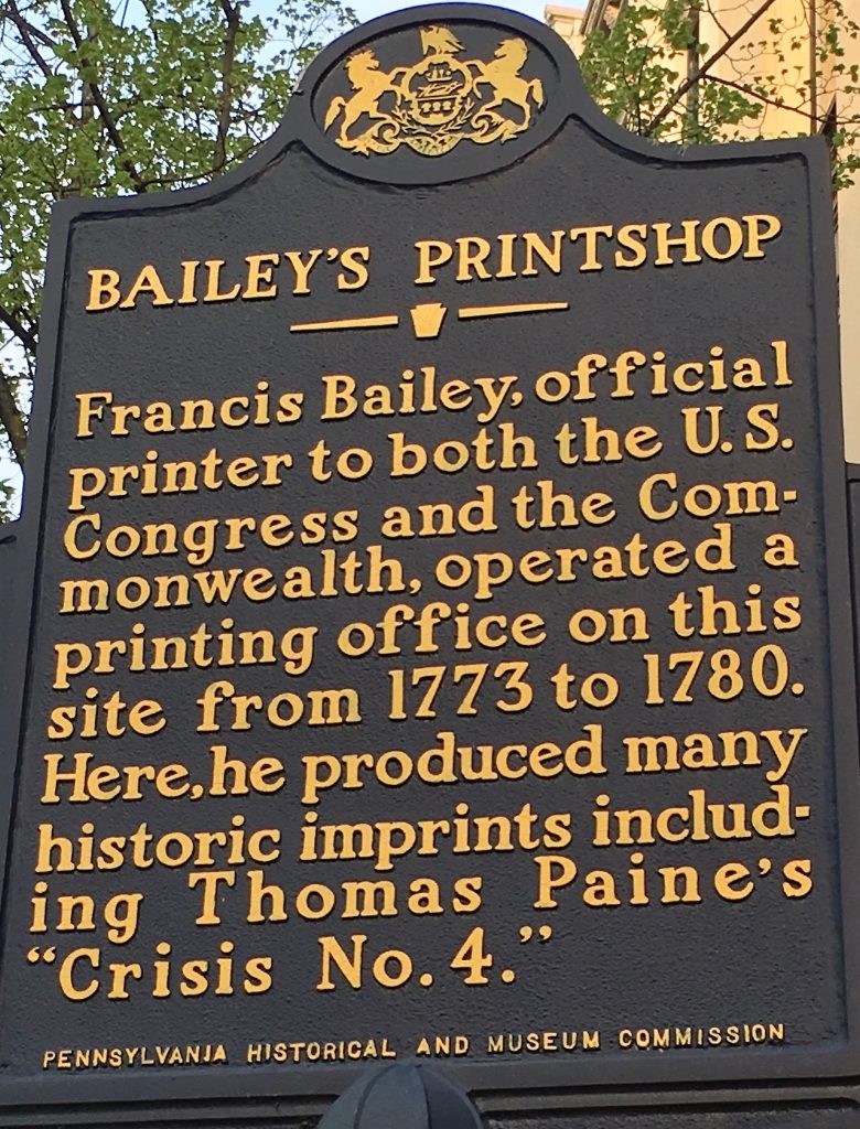 A marker from the Pennsylvania Historical and Museum Commission shows Francis Bailey's Printshop in Lancaster, Pennsylvania. The inscription reads, 'Francis Bailey, official printer to both the U.S. Congress and the Commonwealth, operated a printing office on this site from 1773 to 1780. Here, he produced many historic imprints including Thomas Paine's "Crisis No. 4"' - Pennsylvania Historical and Museum Commission