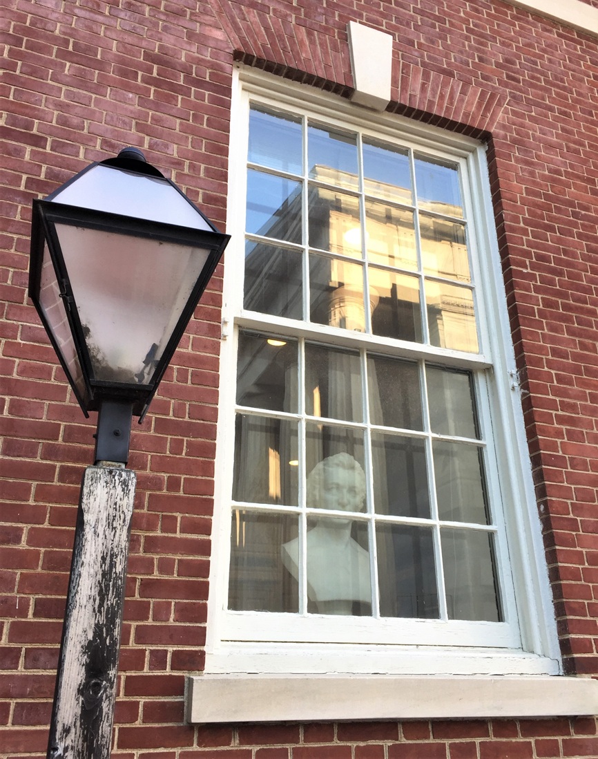 Bust of Thomas Paine looking out from Library Hall of the American Philosophical Society